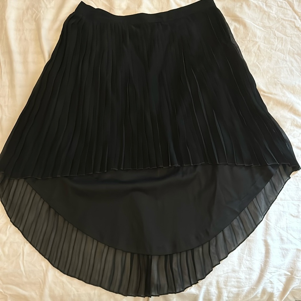 High/low black pleated skirt